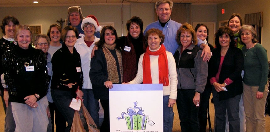 A photo of Morse team providing gifts for kids