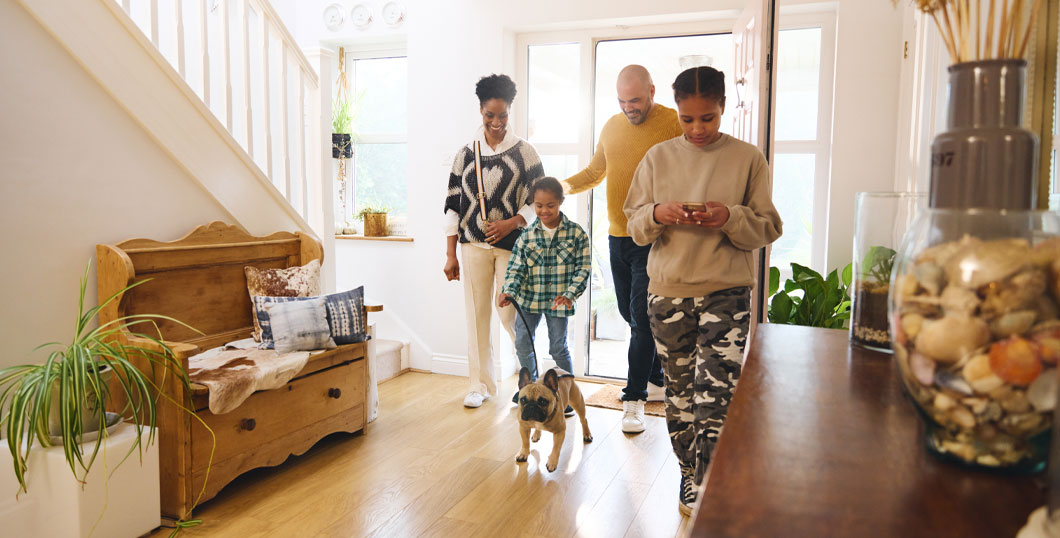 Family at home considering umbrella insurance protection in Massachusetts
