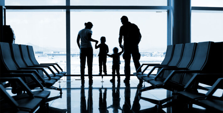 Image of a family waiting at the airport