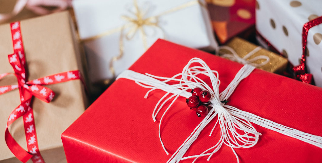 Photo of holiday tech gifts elegantly wrapped