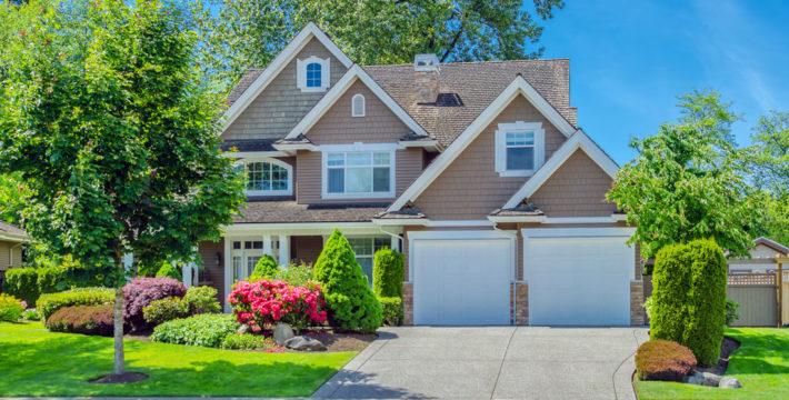 Photo of a medium-large house during summer